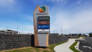 high impact commercial pylon sign on highway