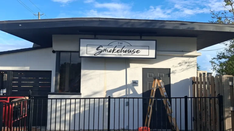 TW Smokehouse illuminated cabinet sign in New Smyrna Beach, FL